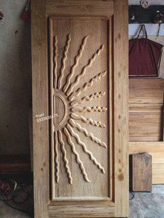 a wooden door with an intricate design on it