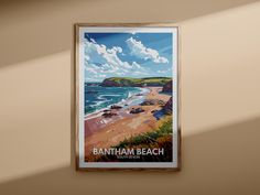 there is a poster hanging on the wall next to a window that says banham beach