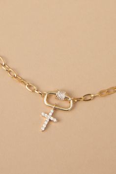 The delicate paperclip chain adds a modern edge, while the sparkling rhinestone cross pendant offers a symbol of faith. Perfect for layering with other necklaces or on its own, this necklace is a versatile must-have. Cross Layered Necklace, Stacked Jewelry Necklaces, Layered Necklaces Gold, Cross Chain Necklace, Faith Apparel, Cross Charm Necklace, Necklace Stack, Grandmas Christmas, Preppy Jewelry