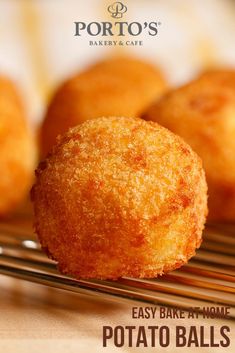 baked potato balls sitting on top of a metal rack