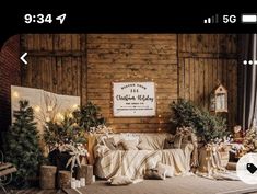 a living room filled with lots of christmas decorations