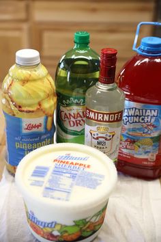 several different types of juices and condiments on a table