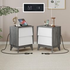 two white and grey nightstands with an open laptop on one side, connected to the other