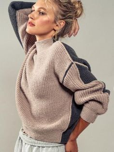 Elevate your everyday style with the Miranda Mocha Mock Neck Sweater. Crafted with a ribbed knit mock neck, this sweater offers a cozy and stylish look. The two-tone design and contrast exposed stitching add a touch of dimension and detail. Perfect for transitioning from work to weekend, this sweater is a must-have for any fashion-forward individual. Fit Guide: Runs true to size Two Tone Sweater, Road Trip Gifts, Boutique Shirts, Denim Short Dresses, Fall Items, Kids Wall Decor, Jean Accessories, Cardigan Shirt, Curvy Dress