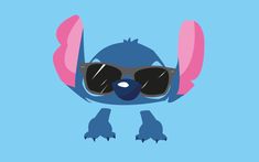 a blue bird with sunglasses on it's face and its wings spread out to the side