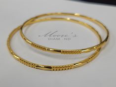 10k jingles (price for pair) Plain Bangles Gold Indian, Bengals Design Gold, Bangels Designes Gold For Women, Machine Bangles Gold, Gold West Indian Bangles, Golden Bangles Indian Design, Bangle Designs Gold, Bangles Jewelry Designs Gold, Gold Bengals