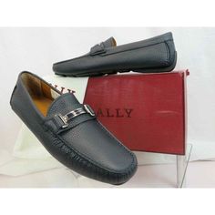 Drulio Navy Grained Leather Metal Logo Driving Loafers By Bally Made In Italy 100% Authentic,Guaranteed Color: Blue Navy (Print On The Box) Grained Leather Upper Stitched Detailed Slip-On Silhouette Squared Moc Toe Metal Lettering Logo Silver Plate Across Vamp Removable "Bally" Stamped Logo Leather Insole Leather Lining Rubber Driver Sole "Bally" Logo At The Back Heel Size Eu 10.5 / Us 11.5 / Fr 44.5 - Print On The Box Original Price $600 Note!!! These Shoes Came From Bally Store In Its Original Business Leather Loafers With Textured Detail, Formal Textured Leather Loafers With Round Toe, Classic Textured Leather Loafers With Round Toe, Black Loafers Men, Alligator Dress Shoes, Suede Dress Shoes, Blue Suede Loafers, Metal Lettering, Bally Shoes