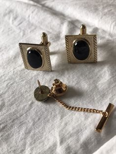 3 pc. Set from the mid 1960's stamped Hayward inside the cufflinks. Black onyx center stone set in a gold tone metal alloy. In good vintage condition. Feel free to convo me with any further questions. Thank you for your interest. Antique Cufflinks For Formal Wear, Antique Cufflinks For Business, French Cuff, Vintage Picnic, Music Box Jewelry, Romantic Picnics, Cuff Jewelry, Vintage Cufflinks, Tie Bar