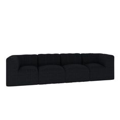 a black couch sitting on top of a white floor