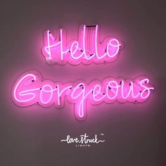 a neon sign that says hello gorgeous