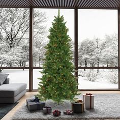 a living room with a christmas tree and presents on the floor