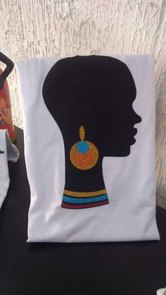 a pillow with an african woman's head on it