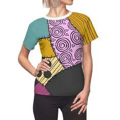 a woman wearing a t - shirt with an abstract design on it