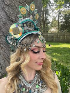 Feel fierce and feminine with this ancient/future inspired headpiece! Designed with dancers/performers in mind, this is perfect for the stage, a photo shoot or festival. It's lightweight with an adjustable strap in the back for a snug fit.  As always- please reach out! I'd love to make something custom for you <3 Fantasy Crown Headpieces For Festival, Bohemian Crown Costume Hat For Carnival, Bohemian Crown Headpiece For Carnival, Bohemian Crown For Carnival, Adjustable Crown Headpiece For Festivals, Adjustable Crown Headpieces For Festival, Bohemian Crown Headpiece For Festival, Bohemian Crown Costume Hat For Costume Party, Adjustable Festival Headband