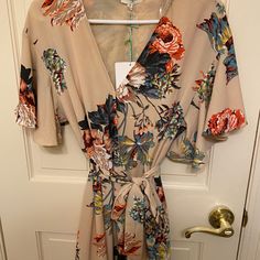 Short Wrap Dress Chic Beige Floral Dress For Spring, Chic Floral Short Sleeve Dress For Date Night, Floral Knee-length Dress For Date Night In Spring, Knee-length Floral Dress For Date Night In Spring, Chic Floral Dress For Date Night With Short Sleeves, Summer Floral Print Midi Dress For Date Night, Summer Midi Dress With Floral Print For Date Night, Chic Spring Floral Dress For Date Night, Chic Floral Dress For Date Night In Spring