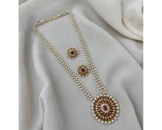 *DESCRIPTION* *NECKLACE WITH EARRINGS* *NECKLACE CLOSURE IS HOOK* *PUSH BACK EARRINGS* *LENGTH OF EARRINGS - 1.25 INCHES (APPROX)* *GOLD TONE , PEARL , STONE* *LIGHTWEIGHT* *PERFECT GIFT FOR YOUR LOVED ONES* *FOR ANY QUERIES AND INFORMATION PLEASE MESSAGE US*  *SHOP LINK - https://www.etsy.com/shop/JAYASJEWELRSART?ref=profile_header * Occasion : Birthday Events, Lovely Valentine's Day Gift, Anniversary Gift, Weeding Gift, Engagement Ring, Lover Gift Ring, Hen Party And Other Occasion.... Your or White Round Jeweled Necklaces, White Jeweled Round Necklace, White Round Jewel Necklaces, White Kundan Necklace With Pearl Pendant For Wedding, Celebration Pearl Chain Necklace, Long Pearl Pendant Necklace For Wedding, Elegant Kundan Necklace With Round Pendant For Wedding, Round Pearl Necklace In Temple Jewelry Style, White Round Pearl Chain Jewelry Set