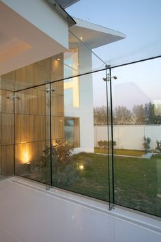 the inside of a house with glass walls