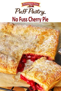 a piece of pie on a cutting board with the words puff pastry no fuss cherry pie