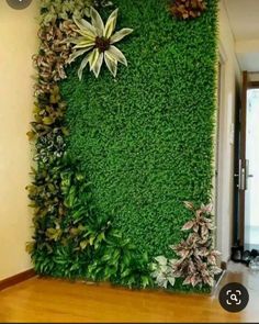 a living room wall covered in grass and flowers