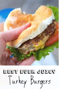 a hand holding a sandwich with lettuce, tomato and egg on it in front of the text overlay reads the juicest turkey burger