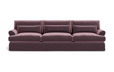 a purple couch sitting on top of a white floor