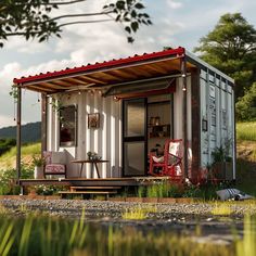 a tiny house made out of shipping containers on the side of a hill with chairs and tables