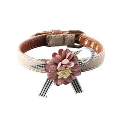 a dog collar with a flower on it