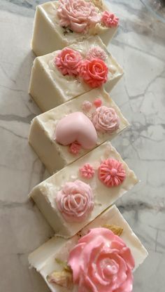 My beautiful and nourhsing handmade shea butter soap is lavender Scented and soothing for your body and face. These bars are 2 inches by 2.5 by 2.9 inches in width. These hand soaps are decorative and handmade with different coloured pink decals made of shea butter. These soaps have a great lather and are decorative for your bathroom.  These soaps are larger with a good size to them. You can customize your colour and size if you request prior to placing the order. Size of pillar candles approx Soap Bars, Pretty Soap Bars, Valentines Soap Ideas, Valentine Soap Diy, Pink Soap Aesthetic, Valentines Melt And Pour Soap, Chocolate San Valentin, Valentine’s Day Soap, Valentine Soap