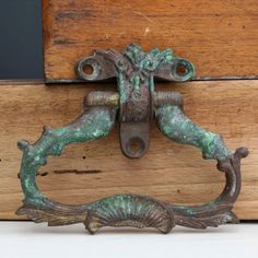 Antique door knocker from the turn of the century. A rare find for front door hardware. This door knocker or door pull came from the French region of Belgium Antique Door Knockers, Front Door Hardware, Bronze Door, Small Door, Green Patina, Small Doors, Turn Of The Century