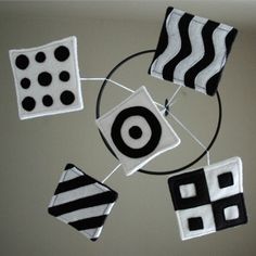 some black and white decorations hanging on the wall