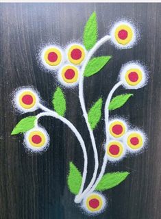 this is an image of some flowers painted on wood