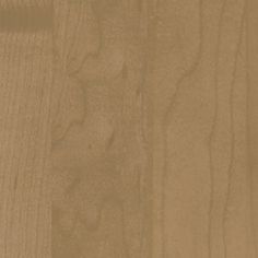 a close up view of the wood grains on a wooden surface, with light brown tones