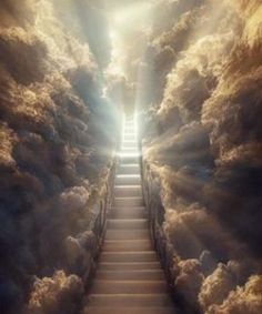 stairway leading to heaven with light coming through the clouds