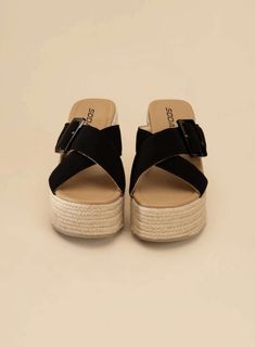 Step out in style with the Manta Espadrille Platform Slides. These trendy slides feature an espadrille wedge platform for a modern look. They have a round open toe for a comfortable fit. The platform heel adds a unique touch and helps to create a fashionable look. Type: Slides Pattern type: Solid Style: Modern Toe: Open toe, round Heel height: Platform Heel shape: Platform Material: Synthetic Imported Trendy Slides, Mule Slides, Farm Clothes, Platform Mules, Espadrilles Platform, Platform Slides, Espadrille Wedge, Platform Heel, Silver Shoes