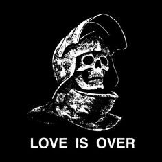 a skull wearing a helmet with the words love is over