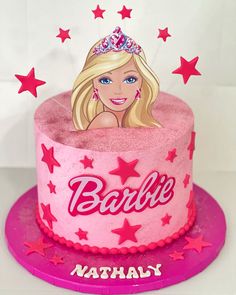 a barbie birthday cake with stars on it