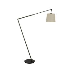 a black floor lamp with a white shade on the base and a light bulb at the end