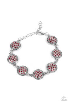 Dotted with fiery red rhinestones, studded silver frames delicately connect around the wrist for a royal flair. Features an adjustable clasp closure.

Sold as one individual bracelet. Red Stone Bracelet, Paparazzi Accessories Jewelry, Red Bracelet, Turquoise Bead Bracelet, Purple Pearl, Silver Frames, Red Bracelets, Purple Rhinestone, Fiery Red