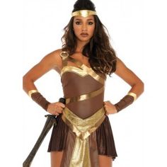 Golden Gladiator Goddess Womens Halloween Costume Our Price $62.00 The hero bodysuit with attached harness and high/low skirt will have you looking fierce and ready for the fight. Paired with the panel belt headband and matching wrist cuffs this warrior is sure to win the war. Sword and other items shown sold separately. #cosplay #costumes #halloween Gladiator Costume, Wonder Woman Accessories, Gladiator Costumes, Long Platinum Blonde, Gold Bodysuit, Warrior Costume, Strapless Bodysuit, Goddess Costume