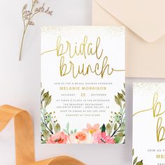 wedding stationery with gold foil lettering and pink flowers