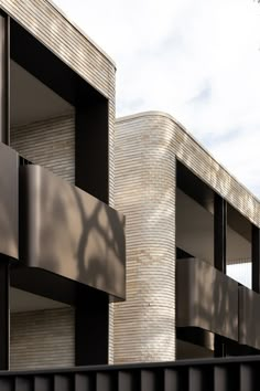 shadows cast on the side of an apartment building