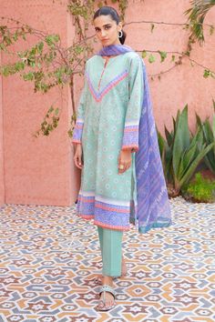 Light Blue Printed Long Sleeve Set, Fitted Patterned Lawn Suit For Summer, Unstitched Light Blue Printed Lawn Suit, Blue Cotton Lawn Suit With Printed Motifs, Blue Long Sleeve Lawn Suit With Printed Motifs, Unstitched Blue Lawn Suit For Summer, Fitted Blue Lawn Suit With Long Sleeves, Casual Blue Lawn Suit For Spring, Casual Blue Cotton Lawn Suit