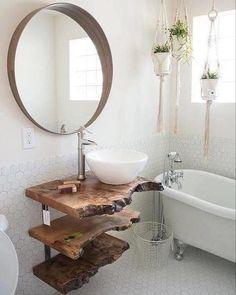 a bathroom with a sink, mirror and bathtub