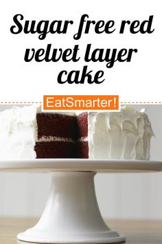 a cake with white frosting sitting on top of a plate next to the words, sugar free red velvet layer cake