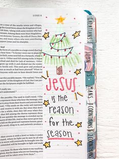 an open bible with the words jesus is the reason for the season