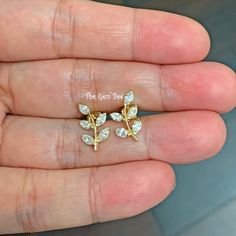 "Thank you for coming in! Extraordinary 14K solid yellow gold diamond olive leaf branch Ear posts with marquise diamonds! 0.63 carat total diamond weight,high quality F-G color, VS-SI clarity. It looks much much nicer in person! It is stamped with \"14k\" which is shown on the back. You'll get one pair per winning! SIZE: 7.5mmx13.5mm Weight: 1.5 gram (approx) MATERIAL: 14k Solid yellow gold, Diamond" Yellow Gold Leaf-shaped Anniversary Jewelry, Yellow Gold Leaf-shaped Jewelry For Anniversary, Anniversary Yellow Gold Leaf Jewelry, Dainty Gold Marquise Cut Jewelry, Dainty Marquise Cut Gold Jewelry, Leaf-shaped Yellow Gold Wedding Jewelry, Leaf-shaped Yellow Gold Jewelry For Weddings, Delicate Marquise Cut Yellow Gold Jewelry, Gold Marquise Cut Sterling Silver Jewelry