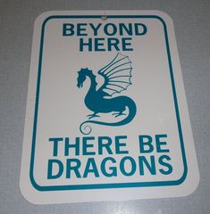 there is a blue and white sign that says beyond here there be dragon's