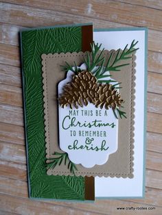 a handmade christmas card with pine cones on it and the words, may this be a christmas to remember christ