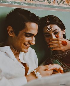 a man and woman sitting next to each other