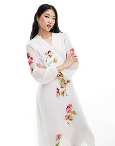 Hope & Ivy Maternity wrap maxi dress with floral embroidery in white | ASOS White V-neck Dress With Floral Embroidery, Fitted V-neck Maxi Dress With Floral Embroidery, Floral Embroidered V-neck Maxi Dress For Brunch, White Long Sleeve Wrap Dress For Spring, Embroidered V-neck Maxi Dress For Brunch, White Feminine V-neck Wrap Dress, White Floral Print V-neck Wrap Dress, White Maxi Dress With Floral Print And Surplice Neckline, White Floral Maxi Dress With Surplice Neckline